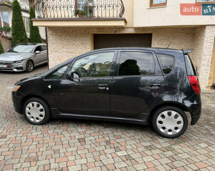 Черный Мицубиси Кольт, объемом двигателя 1.3 л и пробегом 173 тыс. км за 5800 $, фото 9 на Automoto.ua