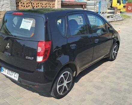 Чорний Міцубісі Кольт, об'ємом двигуна 1.3 л та пробігом 105 тис. км за 6800 $, фото 3 на Automoto.ua