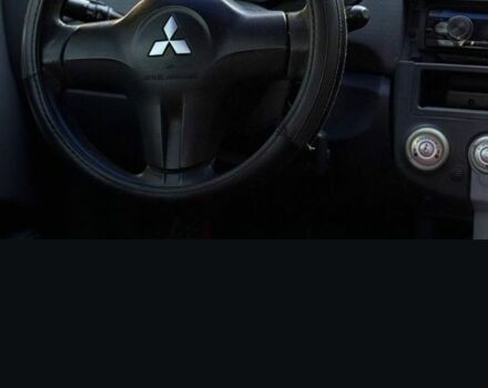 Черный Мицубиси Кольт, объемом двигателя 1.3 л и пробегом 166 тыс. км за 3500 $, фото 5 на Automoto.ua