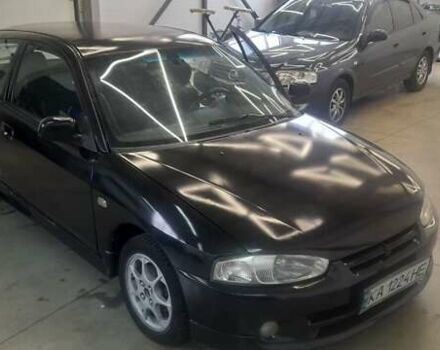 Чорний Міцубісі Кольт, об'ємом двигуна 1.3 л та пробігом 258 тис. км за 3650 $, фото 1 на Automoto.ua