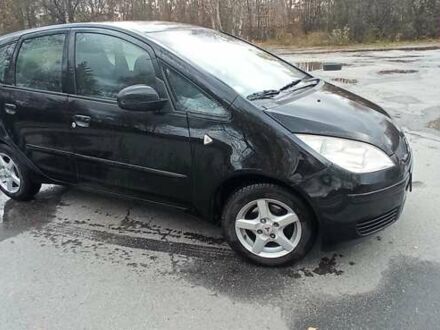 Чорний Міцубісі Кольт, об'ємом двигуна 1.33 л та пробігом 156 тис. км за 3598 $, фото 1 на Automoto.ua