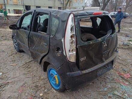 Черный Мицубиси Кольт, объемом двигателя 1.3 л и пробегом 215 тыс. км за 1183 $, фото 1 на Automoto.ua