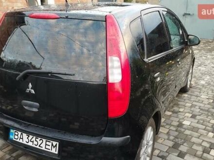 Черный Мицубиси Кольт, объемом двигателя 1.3 л и пробегом 215 тыс. км за 3800 $, фото 1 на Automoto.ua