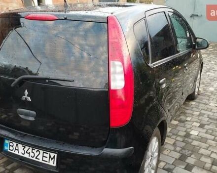 Черный Мицубиси Кольт, объемом двигателя 1.3 л и пробегом 215 тыс. км за 3800 $, фото 1 на Automoto.ua