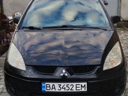 Черный Мицубиси Кольт, объемом двигателя 1.3 л и пробегом 215 тыс. км за 4300 $, фото 1 на Automoto.ua