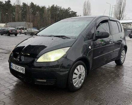 Черный Мицубиси Кольт, объемом двигателя 1.33 л и пробегом 266 тыс. км за 3300 $, фото 1 на Automoto.ua