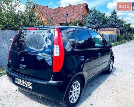 Чорний Міцубісі Кольт, об'ємом двигуна 1.3 л та пробігом 214 тис. км за 3700 $, фото 1 на Automoto.ua