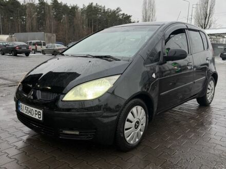 Чорний Міцубісі Кольт, об'ємом двигуна 1.3 л та пробігом 266 тис. км за 3150 $, фото 1 на Automoto.ua