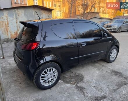 Черный Мицубиси Кольт, объемом двигателя 1.1 л и пробегом 303 тыс. км за 4000 $, фото 1 на Automoto.ua