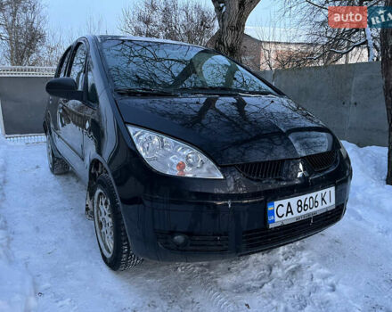 Черный Мицубиси Кольт, объемом двигателя 1.3 л и пробегом 202 тыс. км за 4200 $, фото 1 на Automoto.ua