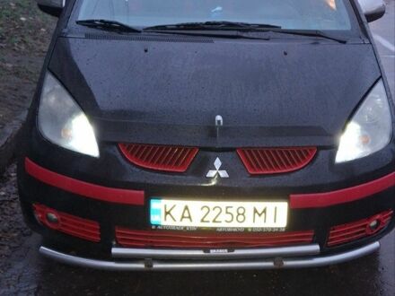 Черный Мицубиси Кольт, объемом двигателя 1.3 л и пробегом 280 тыс. км за 3500 $, фото 1 на Automoto.ua