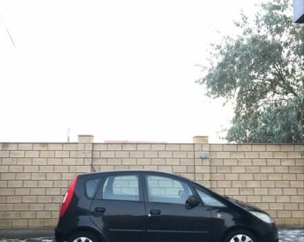 Черный Мицубиси Кольт, объемом двигателя 1.3 л и пробегом 234 тыс. км за 3999 $, фото 1 на Automoto.ua