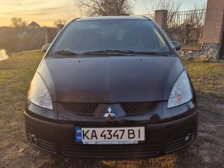 Черный Мицубиси Кольт, объемом двигателя 1.33 л и пробегом 184 тыс. км за 5000 $, фото 1 на Automoto.ua