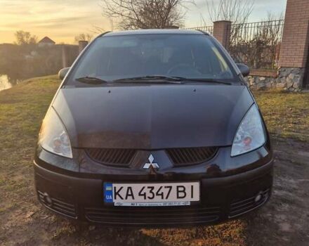 Черный Мицубиси Кольт, объемом двигателя 1.33 л и пробегом 184 тыс. км за 5000 $, фото 1 на Automoto.ua