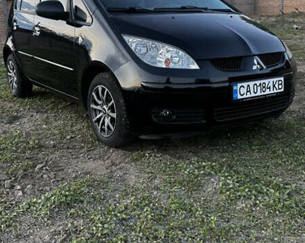 Чорний Міцубісі Кольт, об'ємом двигуна 1.47 л та пробігом 165 тис. км за 5100 $, фото 1 на Automoto.ua