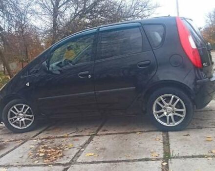 Чорний Міцубісі Кольт, об'ємом двигуна 1.3 л та пробігом 200 тис. км за 3000 $, фото 1 на Automoto.ua