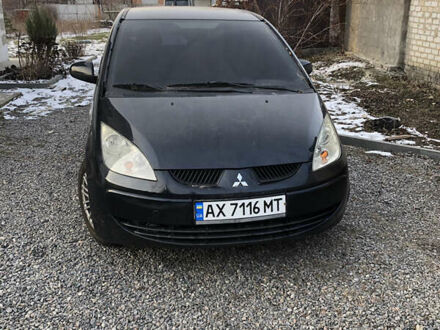 Міцубісі Кольт 2007 у Харкові на Automoto.ua Чорний Міцубісі Кольт, об'ємом двигуна 1.3 л та пробігом 170 тис. км за 3200 $, фото 1 на Automoto.ua
