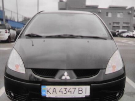 Черный Мицубиси Кольт, объемом двигателя 1.3 л и пробегом 184 тыс. км за 5000 $, фото 1 на Automoto.ua