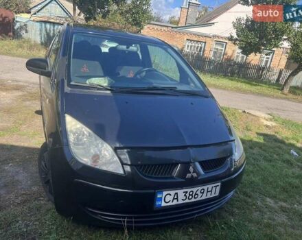Черный Мицубиси Кольт, объемом двигателя 1.3 л и пробегом 195 тыс. км за 3500 $, фото 1 на Automoto.ua