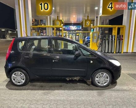 Черный Мицубиси Кольт, объемом двигателя 1.3 л и пробегом 231 тыс. км за 2999 $, фото 1 на Automoto.ua