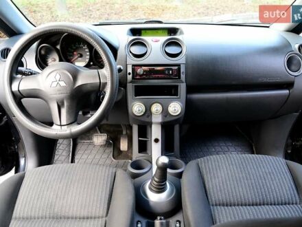 Черный Мицубиси Кольт, объемом двигателя 1.32 л и пробегом 161 тыс. км за 4500 $, фото 1 на Automoto.ua