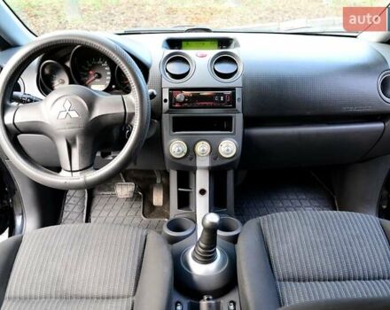 Чорний Міцубісі Кольт, об'ємом двигуна 1.32 л та пробігом 161 тис. км за 4500 $, фото 1 на Automoto.ua