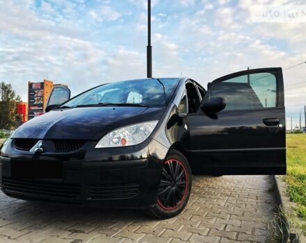 Черный Мицубиси Кольт, объемом двигателя 1.3 л и пробегом 180 тыс. км за 5343 $, фото 1 на Automoto.ua