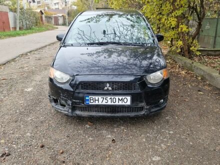 Чорний Міцубісі Кольт, об'ємом двигуна 1.3 л та пробігом 200 тис. км за 1100 $, фото 1 на Automoto.ua