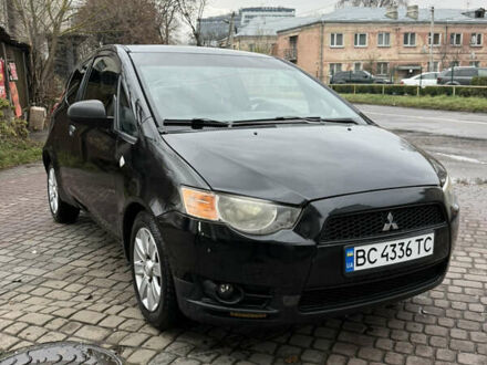 Черный Мицубиси Кольт, объемом двигателя 1.33 л и пробегом 250 тыс. км за 4000 $, фото 1 на Automoto.ua