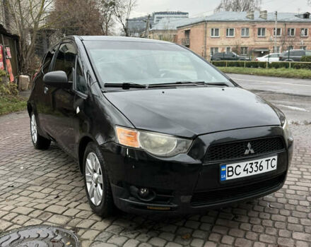 Черный Мицубиси Кольт, объемом двигателя 1.33 л и пробегом 250 тыс. км за 4000 $, фото 1 на Automoto.ua