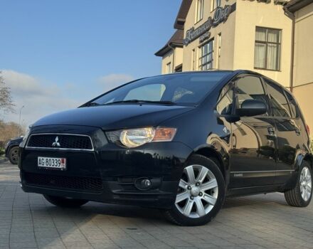Черный Мицубиси Кольт, объемом двигателя 1.3 л и пробегом 170 тыс. км за 7100 $, фото 1 на Automoto.ua