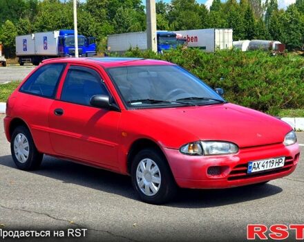 Красный Мицубиси Кольт, объемом двигателя 1.3 л и пробегом 102 тыс. км за 1300 $, фото 3 на Automoto.ua