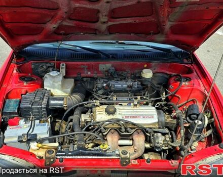 Красный Мицубиси Кольт, объемом двигателя 1.3 л и пробегом 102 тыс. км за 1300 $, фото 7 на Automoto.ua