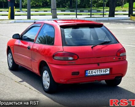 Красный Мицубиси Кольт, объемом двигателя 1.3 л и пробегом 102 тыс. км за 1300 $, фото 1 на Automoto.ua