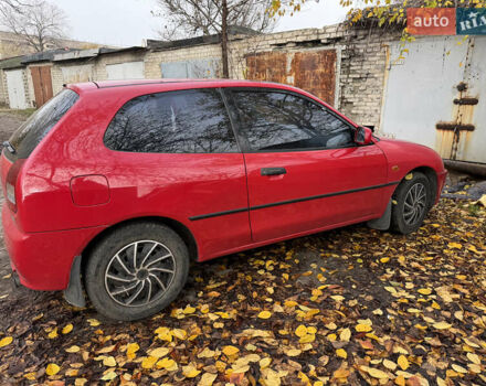 Красный Мицубиси Кольт, объемом двигателя 1.3 л и пробегом 210 тыс. км за 2500 $, фото 4 на Automoto.ua