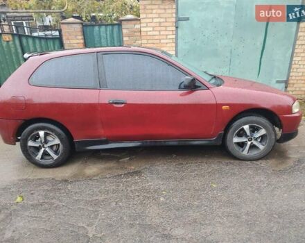 Красный Мицубиси Кольт, объемом двигателя 1.3 л и пробегом 200 тыс. км за 1300 $, фото 3 на Automoto.ua