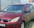 Красный Мицубиси Кольт, объемом двигателя 1.33 л и пробегом 290 тыс. км за 2199 $, фото 1 на Automoto.ua