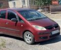 Красный Мицубиси Кольт, объемом двигателя 1.33 л и пробегом 290 тыс. км за 2199 $, фото 1 на Automoto.ua