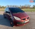 Красный Мицубиси Кольт, объемом двигателя 1.33 л и пробегом 260 тыс. км за 2000 $, фото 1 на Automoto.ua