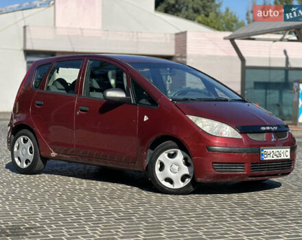 Красный Мицубиси Кольт, объемом двигателя 1.33 л и пробегом 205 тыс. км за 3500 $, фото 1 на Automoto.ua