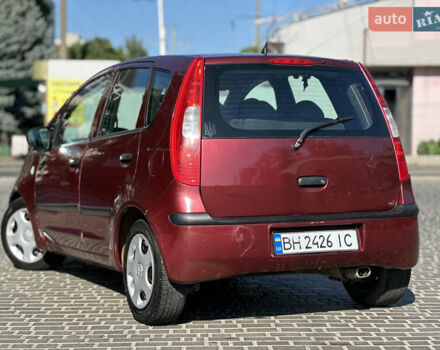 Красный Мицубиси Кольт, объемом двигателя 1.33 л и пробегом 205 тыс. км за 3500 $, фото 3 на Automoto.ua