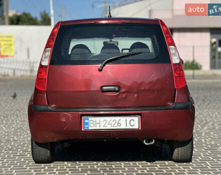 Красный Мицубиси Кольт, объемом двигателя 1.33 л и пробегом 205 тыс. км за 3500 $, фото 10 на Automoto.ua