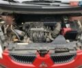 Красный Мицубиси Кольт, объемом двигателя 1.12 л и пробегом 210 тыс. км за 3300 $, фото 9 на Automoto.ua