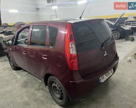 Красный Мицубиси Кольт, объемом двигателя 1.3 л и пробегом 300 тыс. км за 4000 $, фото 5 на Automoto.ua