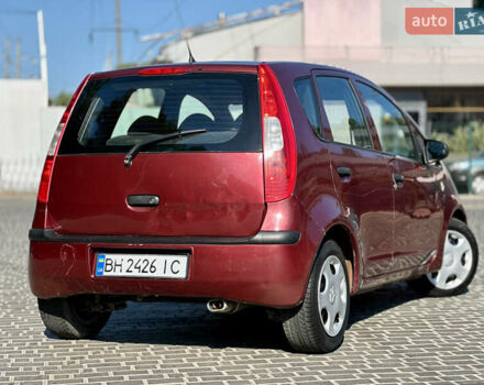 Красный Мицубиси Кольт, объемом двигателя 1.33 л и пробегом 205 тыс. км за 3500 $, фото 2 на Automoto.ua