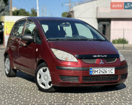 Красный Мицубиси Кольт, объемом двигателя 1.33 л и пробегом 205 тыс. км за 3500 $, фото 6 на Automoto.ua