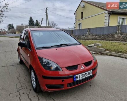 Красный Мицубиси Кольт, объемом двигателя 1.33 л и пробегом 241 тыс. км за 2850 $, фото 1 на Automoto.ua