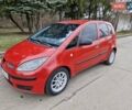 Красный Мицубиси Кольт, объемом двигателя 1.33 л и пробегом 241 тыс. км за 2850 $, фото 6 на Automoto.ua