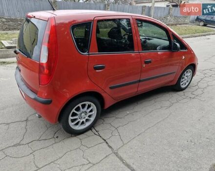 Красный Мицубиси Кольт, объемом двигателя 1.33 л и пробегом 241 тыс. км за 2850 $, фото 3 на Automoto.ua