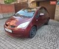 Красный Мицубиси Кольт, объемом двигателя 1.3 л и пробегом 105 тыс. км за 4000 $, фото 1 на Automoto.ua